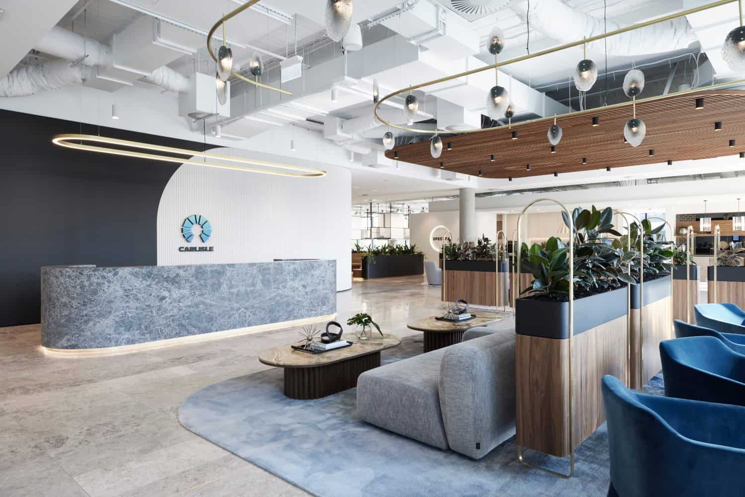 Reception area full of plants in a corporate environment